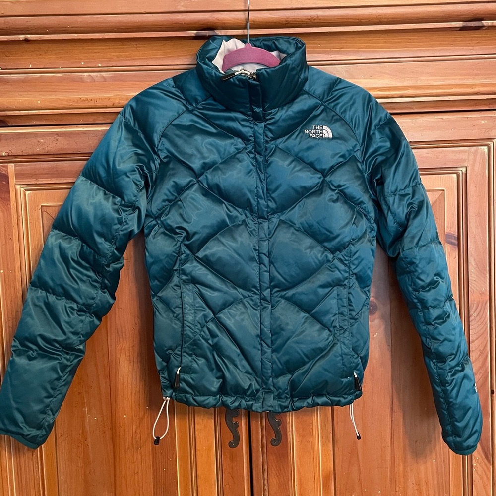 The North Face teal puffer coat